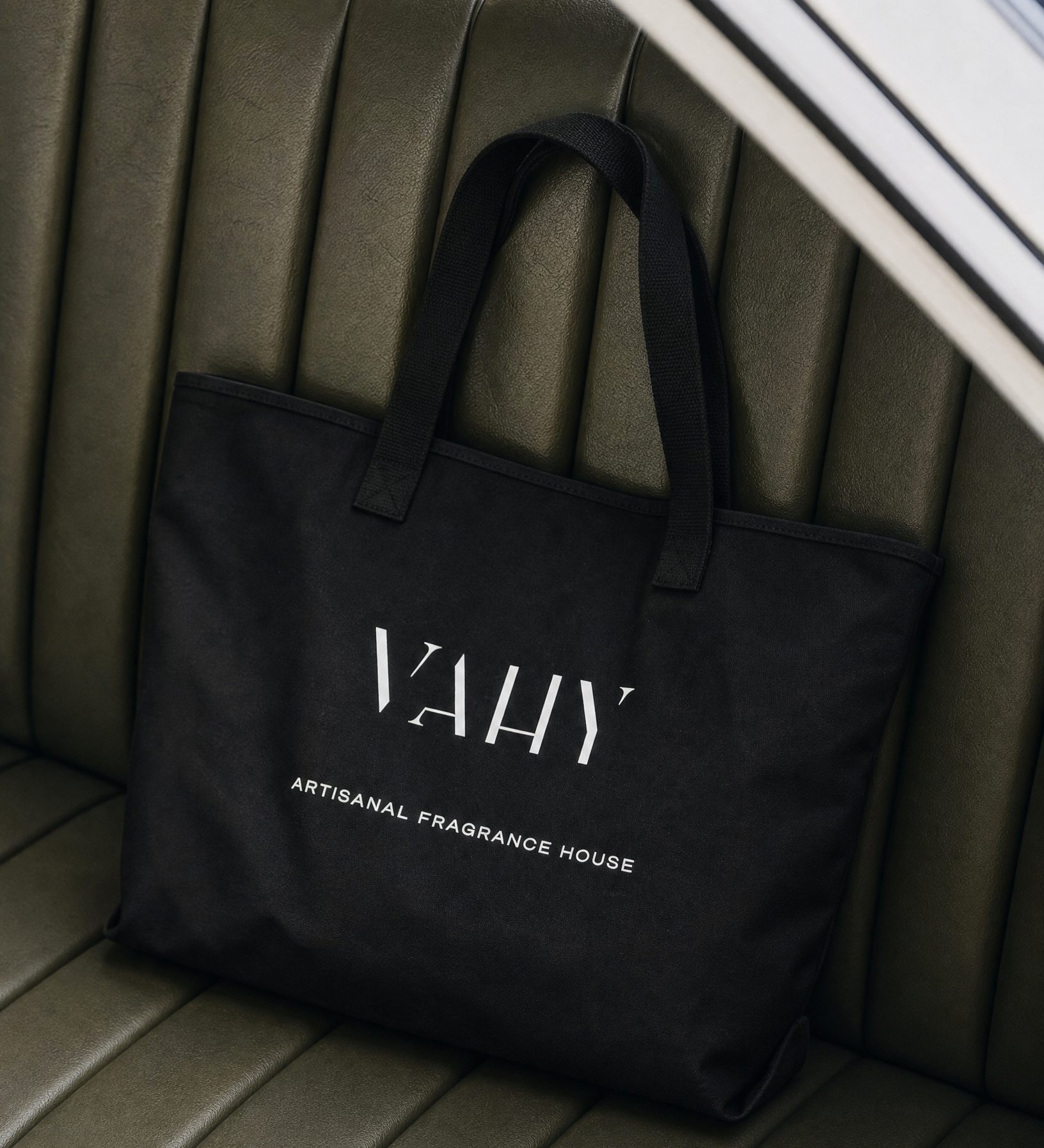 Generated_with_Kive.ai_-_Black_canvas_tote_Remove_the_female_model_from_this_and_use_it_in_this_product_setting_Sable_Lintel.png